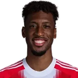 K. Coman
